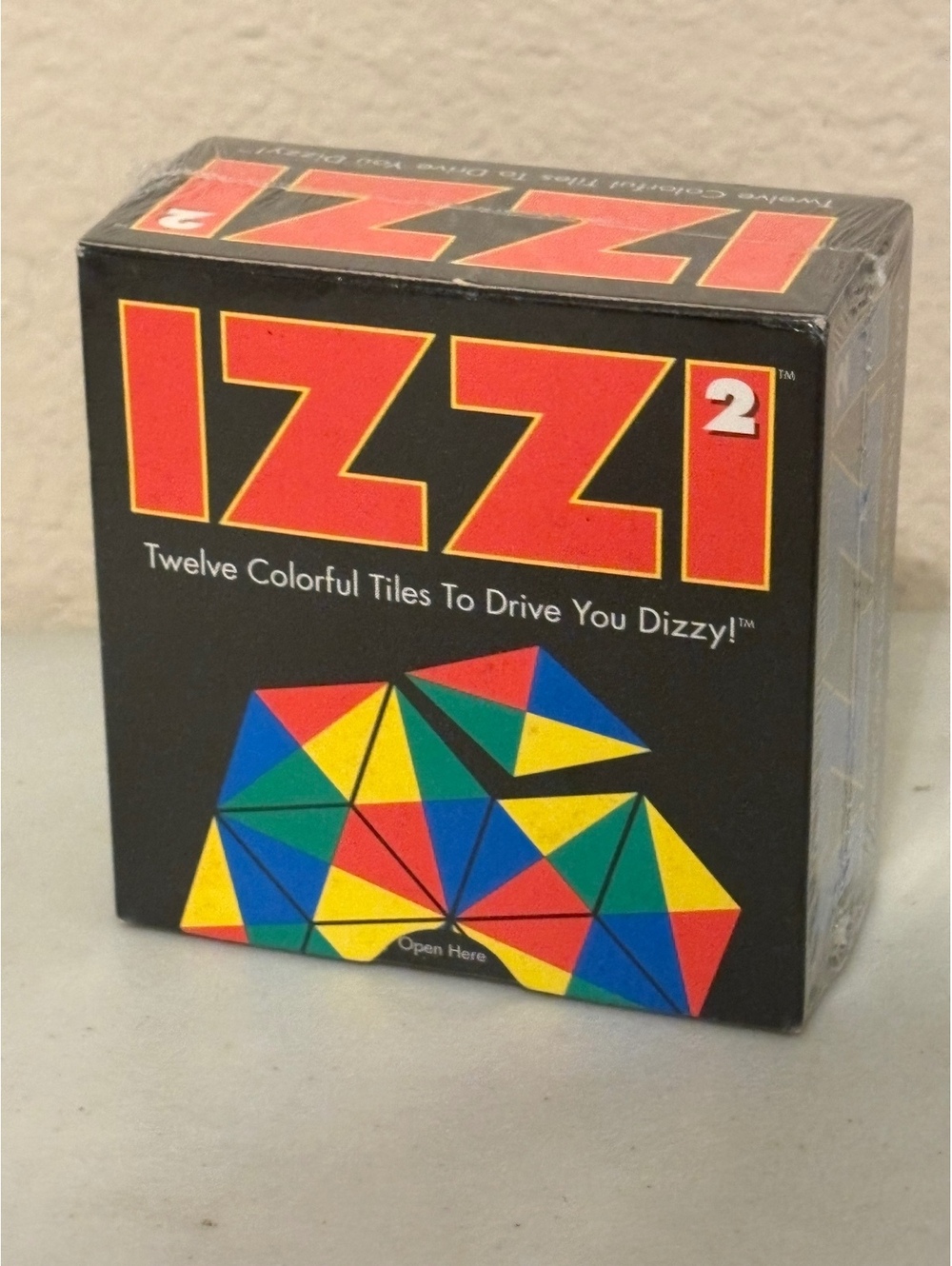 Izzi 2 Puzzle Game - Twelve Colorful Tiles